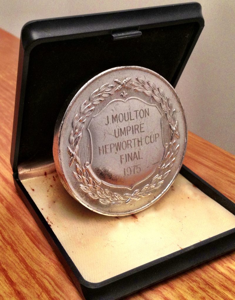 Medal in its case engraved J. Moulton, Umpire, Hepworth Cup Final, 1975