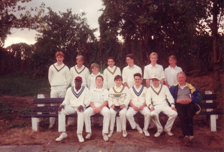 Team Photo on the Clubhouse Bench